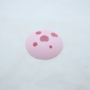 vpun_5reikadiz pyöreä kiekko joka on melkein puolipallon muotoinen. Kiekossa on 5 eri kokoista reikää.
