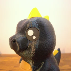 Lapsen säästöpossu dinosauruksen pää sivulta.