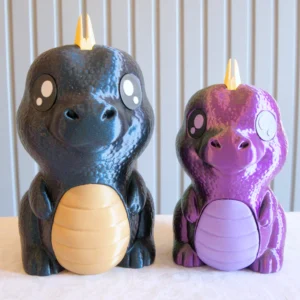 Kaksi dinosaurus säästöpossua