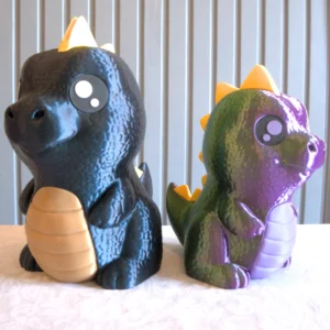 Kaksi dinosaurus säästöpossua