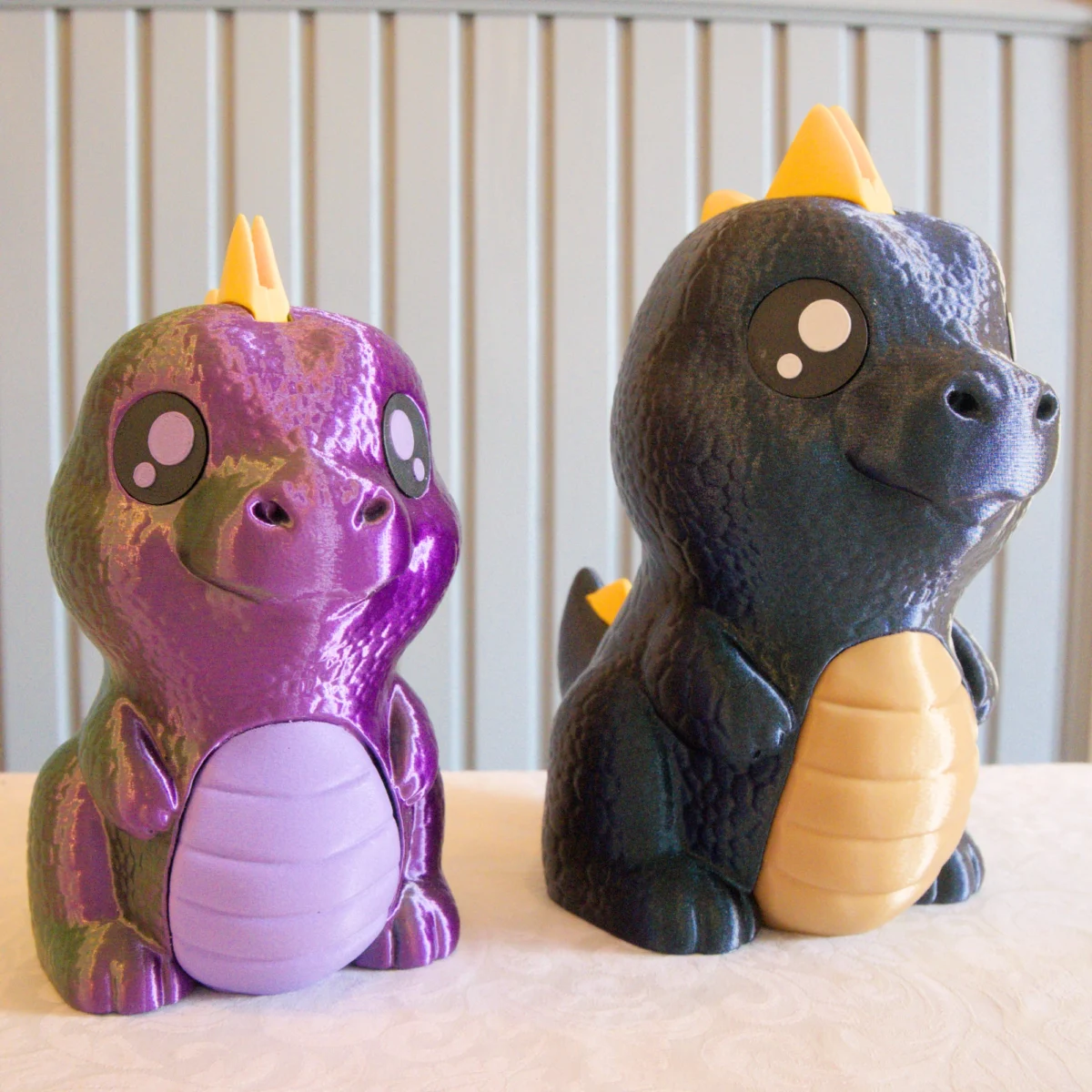 Kaksi dinosaurus säästöpossua